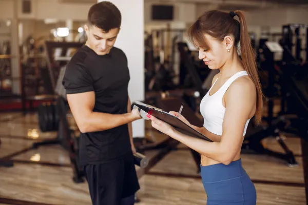 a-beautiful-sports-couple-is-engaged-in-a-gym-2026-01-06-10-00-48-utc1-69972c926d41a