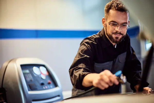 a-male-mechanic-using-a-tool-to-repair-the-car-a-2026-01-11-10-45-39-utc1-69972ae64c9f8