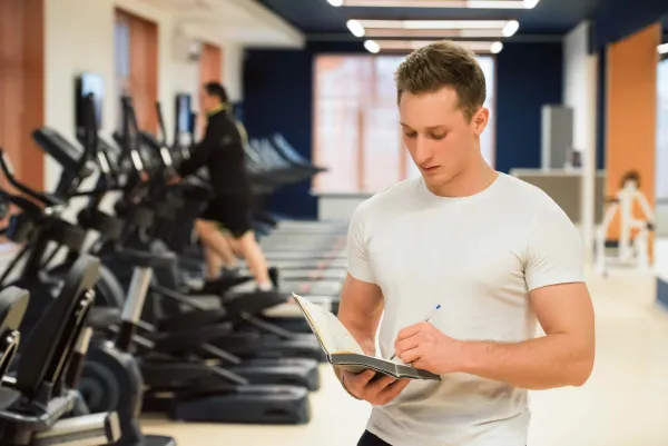 close-up-of-male-coach-athlete-standing-at-gym-2026-01-05-05-28-53-utc1-699728c440cd6